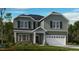 Charming two-story home with a two-car garage, a covered entry, and a well-maintained lawn at 668 Morning Glade St, Wake Forest, NC 27587