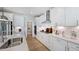 Bright kitchen featuring sleek countertops, cabinetry, and modern appliances at 668 Morning Glade St, Wake Forest, NC 27587