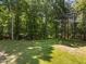 The backyard is spacious and well-maintained, providing plenty of room for outdoor activities at 7000 Millstone Ridge Ct, Raleigh, NC 27614