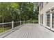 An expansive deck has plenty of room for entertaining or just relaxing at 7000 Millstone Ridge Ct, Raleigh, NC 27614