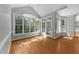 Bright dining room features natural light, hardwood floors, and vaulted ceilings at 7000 Millstone Ridge Ct, Raleigh, NC 27614