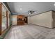 Open concept living room with lots of space, view into kitchen area at 825 Whispering Wind Rd, Burlington, NC 27217