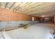 Unfinished basement featuring concrete walls, exposed ceiling, and ample space at 877 Millcroft, Pittsboro, NC 27312