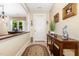 Elegant foyer with neutral walls, tile floors, and decorative accents at 877 Millcroft, Pittsboro, NC 27312
