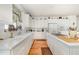 Functional kitchen featuring white cabinetry, ample counter space, and modern appliances at 877 Millcroft, Pittsboro, NC 27312