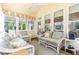 Bright and airy sunroom with plenty of windows, perfect for relaxation and enjoying natural light at 877 Millcroft, Pittsboro, NC 27312