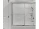 Clean, well-lit bathroom featuring a shower-tub combo with a glass door at 1004 Bridgewater Dr, Durham, NC 27704