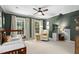 Cozy bedroom featuring an accent wall and comfortable seating at 103 Saint Brides Ct, Cary, NC 27518