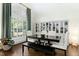 Dining room with large window, built-in cabinets, and stylish seating for entertaining at 103 Saint Brides Ct, Cary, NC 27518