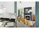Open concept living room and kitchen with granite countertops and stainless sink at 103 Saint Brides Ct, Cary, NC 27518