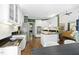 Bright kitchen features stainless steel appliances, granite countertops and a convenient island at 103 Saint Brides Ct, Cary, NC 27518