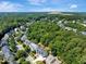 Residential neighborhood features lush trees and manicured lawns at 10809 Grassy Creek Pl, Raleigh, NC 27614