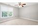 Bedroom with carpet, window, and ceiling fan at 1084 Wild Briar Ln, Stem, NC 27581