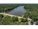 Beautiful lake view from above, revealing the vastness of the lake and the surrounding lush greenery at 109 N Fern Abbey Ln, Cary, NC 27518