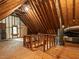 Unfinished attic space with exposed rafters, showcasing potential for customization and storage at 109 N Fern Abbey Ln, Cary, NC 27518