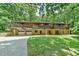Beautiful multi-level home with dual garage doors and balconies surrounded by mature trees at 110 Wolfs Trl, Chapel Hill, NC 27516