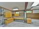 The garage space features built in shelving and work spaces at 110 Wolfs Trl, Chapel Hill, NC 27516