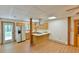 The kitchen features wood cabinets, laminate floors, and stainless steel appliances at 110 Wolfs Trl, Chapel Hill, NC 27516