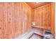 Classic wood sauna with bench seating and heater at 110 Wolfs Trl, Chapel Hill, NC 27516