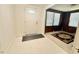 Welcoming entryway featuring tile flooring and a traditional-style front door at 1112 N Driver St, Durham, NC 27701