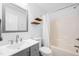Bathroom featuring tub and shower combo, modern vanity, and light grey walls at 1138 Ricochet Dr, Raleigh, NC 27610