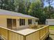 The spacious wooden deck is perfect for relaxing and entertaining, offering seamless indoor-outdoor living at 117 Lema Dr, Garner, NC 27529