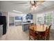 Spacious kitchen with a center island, wooden table, and modern appliances at 117 Lema Dr, Garner, NC 27529