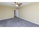 Large bedroom features carpet, ceiling fan, and neutral walls at 117 Renee Dr, Smithfield, NC 27577