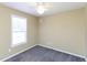 Serene bedroom includes a ceiling fan, a window and neutral walls at 117 Renee Dr, Smithfield, NC 27577