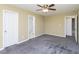 Bedroom features neutral paint, ceiling fan and carpet at 117 Renee Dr, Smithfield, NC 27577