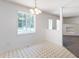 Bright dining area filled with natural light from the window at 117 Renee Dr, Smithfield, NC 27577