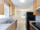 Kitchen sink featuring stainless steel dual basin and window view at 117 Renee Dr, Smithfield, NC 27577