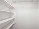 Walk-in closet with open shelving offering practical storage solutions at 120 Polks Landing Rd, Chapel Hill, NC 27516