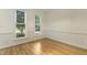 Bright bedroom with hardwood floors, trim and lots of natural light at 122 N Fern Abbey Ln, Cary, NC 27518