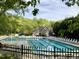 Enjoy the community pool with plenty of seating at 122 N Fern Abbey Ln, Cary, NC 27518