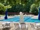 Enjoy the community pool with plenty of seating and shade at 122 N Fern Abbey Ln, Cary, NC 27518