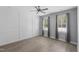 Bedroom featuring a ceiling fan, lots of light and neutral paint at 1230 S 2Nd St, Smithfield, NC 27577