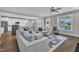 Spacious open-concept living room featuring a kitchen, dining area, and comfortable seating at 1230 S 2Nd St, Smithfield, NC 27577
