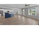 Bright living room featuring an open floor plan, stainless steel appliances, and modern finishes at 1230 S 2Nd St, Smithfield, NC 27577