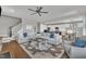Open living room boasts lots of seating and natural light with a view of the kitchen and dining at 1230 S 2Nd St, Smithfield, NC 27577