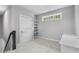 Bright room with a door, closet shelves, and a built-in desk, perfect for a home office at 1230 S 2Nd St, Smithfield, NC 27577