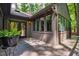 A spacious back deck is featured, with access to the home's sunroom, providing tranquil outdoor relaxation at 128 Shadowbrook, Pittsboro, NC 27312