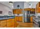 Spacious kitchen with stainless steel appliances and breakfast bar at 128 Shadowbrook, Pittsboro, NC 27312