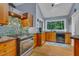 Modern kitchen with custom cabinets and large window at 128 Shadowbrook, Pittsboro, NC 27312