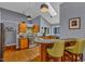 Bright kitchen featuring stylish counters and wooden cabinets at 128 Shadowbrook, Pittsboro, NC 27312