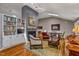 Spacious living room featuring high ceilings, a fireplace, and views of the dining area at 128 Shadowbrook, Pittsboro, NC 27312