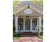 Boutique storefront featuring a stylish sign and a well-lit display window, inviting shoppers inside at 128 Shadowbrook, Pittsboro, NC 27312
