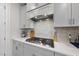 A well-equipped kitchen with stainless steel appliances and elegant countertops, perfect for culinary enthusiasts at 129 Alumroot Rd, Holly Springs, NC 27540