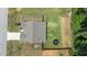 Aerial shot of the property showcasing the fenced backyard and ample green space at 145 Bounding Ln, Youngsville, NC 27596