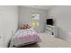 Bright bedroom with carpet floors is a cheerful and inviting space at 145 Bounding Ln, Youngsville, NC 27596